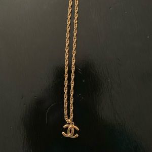 Authentic vintage Chanel gold logo necklace